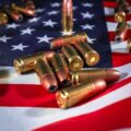 Handgun cartridges on an American flag